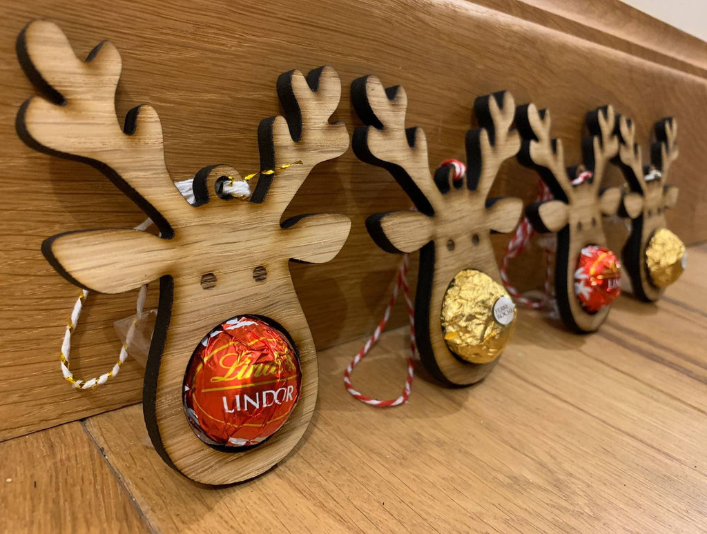 Lindor Christmas Baubles, Four Oak Reindeer Decorations with Chocolate cut out Ferrero/Lindor